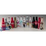 Coke Cola Collectors metal limited edition bottles, all aluminium bottles, 11 unused Coke Cola,