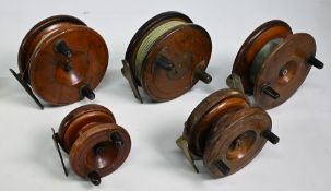 A collection of mahogany and brass reels, as follows: 5