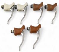 Campagnolo Brake Levers Two pairs with drilled levers one without all having rubber protectors on