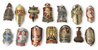 Vintage Bicycle Head Badges to feature various companies to include Triumph, Norman, Holmes,