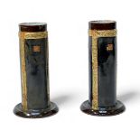 A pair of Royal Doulton stoneware pottery vases, of cylindrical form, with gilded and orange