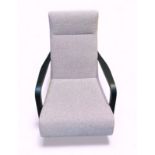 A Camerich Simon lounge chair, in brown walnut.