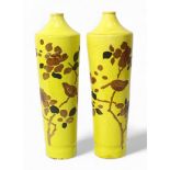 A pair of 19th century Japanese Awaji pottery yellow ground bottle vases, Meiji period, of