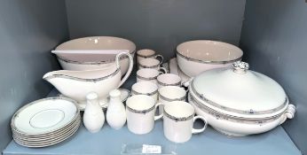 A Wedgwood 'Amherst' patterned part dinner service, including serving tureens, salad bowls, soup