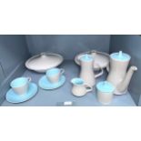 An assortment of Poole Pottery tea wares in the twin-tone 'Dove Grey' and 'Sky Blue' colour