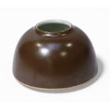 A Chinese 'cafe au lait' brown glazed brush washer, of simple dome form, with Kangxi underglaze blue