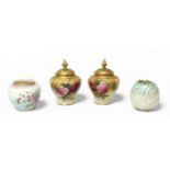 A pair of Royal Worcester potpourri vases and pierced covers, dated 1912, of inverted baluster form,