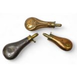 Three brass and copper powder flasks, including one stamped ‘James Dixon & Sons Sheffield’ with