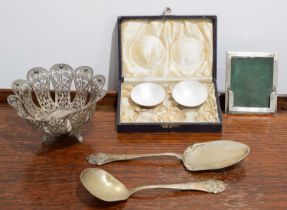 A selection of silver and white metal items.