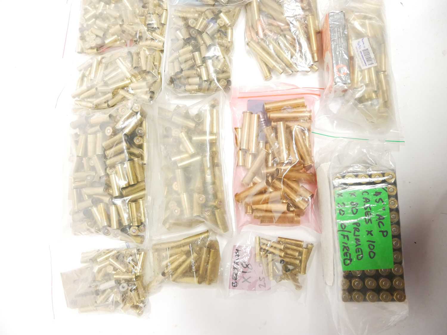 Collection of mixed primed and unprimed brass cases and some bullet heads, to include 9mm, .45 - Image 2 of 12