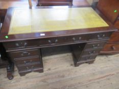 A reproduction twin pedestal desk width 48ins, depth 24ins, height 31ins