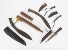 Four assorted Kukri knives various sizes, and two other swords and dagger. (6).