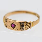 A ruby and diamond ring, set in 15ct yellow gold, approx 2.1g, size R.
