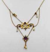 An Edwardian Art Nouveau style amethyst and seed pearl necklace (not hallmarked).