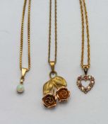 Three 9ct gold dress necklaces with pendants, total weight 11.4g.