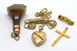 A small collection of jewellery to include a gold heart locket (not hallmarked) on a 18ct gold chain