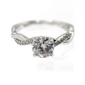 A moissanite twist design ring, set in 18k white gold, size H, with copy of grading report: approx