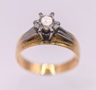 A diamond solitaire ring, set in 18ct yellow gold, size O/P, approx 4.7g.
