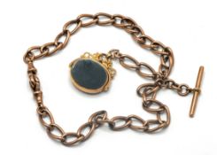 A gold 'T' bar watch chain, set in 9ct gold, attached with a 9ct gold bloodstone fob with initials