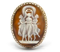 A large cameo brooch decorated with three women, set in 9ct, approx 18.9g.