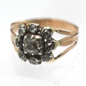 A gold and diamond 'square' shape style ring, set in gold (not hallmarked), size R (misshaped),