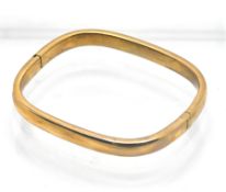 A 'square' shaped bangle, set in 9ct gold, total weight 11.9g.