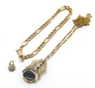 A gold fob pendant, set in 9ct gold on a 9ct gold chain, a 9ct gold chain and a 9ct gold pendant,