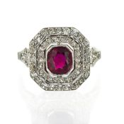 A fine diamond and ruby set ring, set in 18ct white gold, size N.
