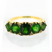A green five stone and diamond ring, possibly Tsavorite/garnet, circa 1900, size L.