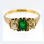 An emerald and diamond three stone ring, circa late Victorian /Edwardian style yellow gold