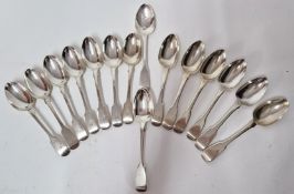 A collection of silver dessert spoons, to include a set of six and set of seven, with two others,