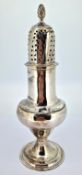 A George III silver sugar sifter, of baluster form with twirl finial, hallmarked London 1784,