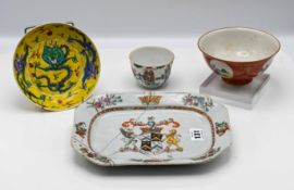 A small ‘famille-rose’ Armorial meat dish, Qianlong (1736-1795), of canted rectangular from,