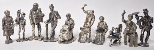 A set of white metal filled factory worker models, together with two pewter examples. (10)