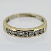 A diamond half eternity ring, set in 18ct yellow gold, size M/N.