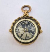 A blood stone and compass fob, set in 9ct gold, approx 8.1g (does not swivel).