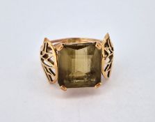 A gold and yellow/golden colour stone, (indistinct hallmark), size O, approx 5.8g.