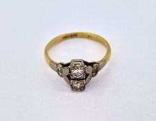 An antique two stone diamond ring, set in 18ct yellow gold, size O, approx 2.8g.