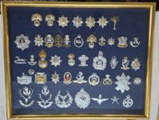 A set of New Regular Army Cap Badges, together with a set of the New Brigades Badges, in two gilt