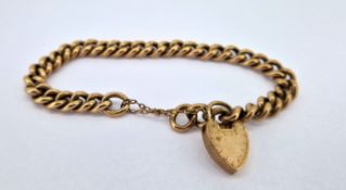 A 9ct gold curb link bracelet with heart padlock, approx 12.2g.
