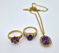 Two 9ct gold amethyst set dress rings together with a 9ct gold amethyst set pendant, total weight