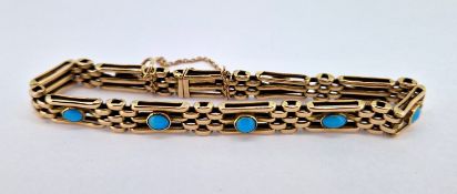 A 9ct gold gate style bracelet set with turquoise stones, approx 10.4g.