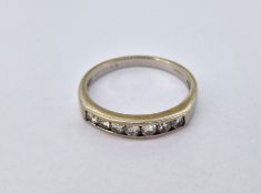 A diamond half eternity ring, size M, approx 2.7g.