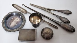 A collection of silver items, to include silver matchbox case, marrow spoon, ashtray and cup, and