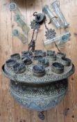 A large brass 16-shade Mosque lamp, overall decorated with pierced Islamic decoration, together with