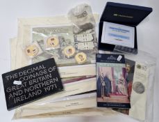 A collection of commemorative coins and first day covers, to include 2007 Wembley FA Cup Final one