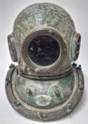A Japanese twelve bolt diving helmet, circa 1950s/60s, with glass viewing hole.