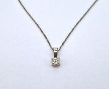 A single stone diamond set pendant on a 18ct white gold chain.
