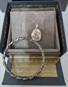 Clogau, a silver Tree of Life diamond locket on silver chain, boxed.
