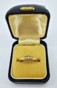 A small five stone diamond ring, set in 18ct yellow gold, size K, approx 2.9g.
